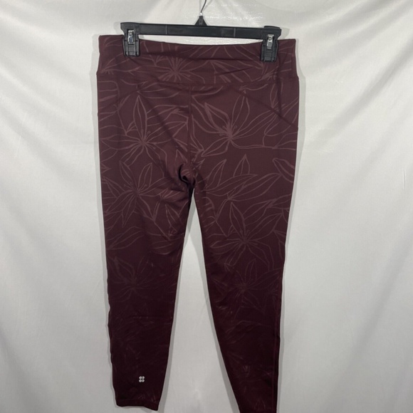 NWT Sweaty Betty [ Large ] Floral All Day Embossed Leggings in Plum Red - Picture 7 of 12